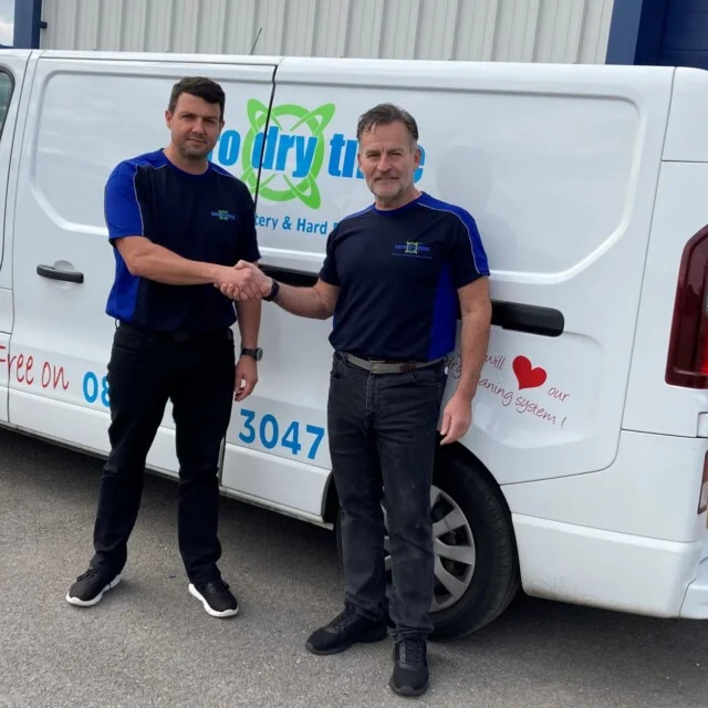 ZeroDryTime franchisee Jethro shaking hands with a customer