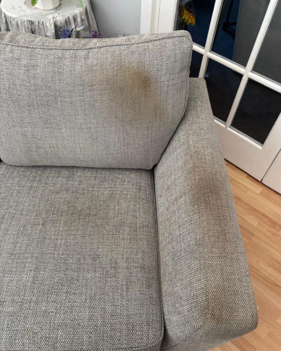 Grey sofa before cleaning